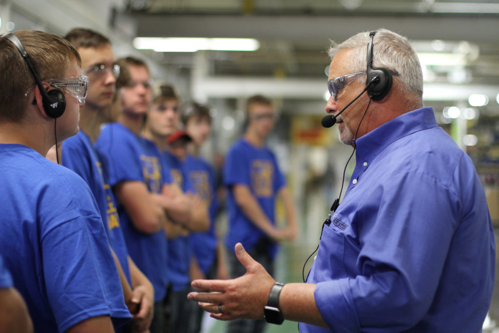 Students touring manufacturing company